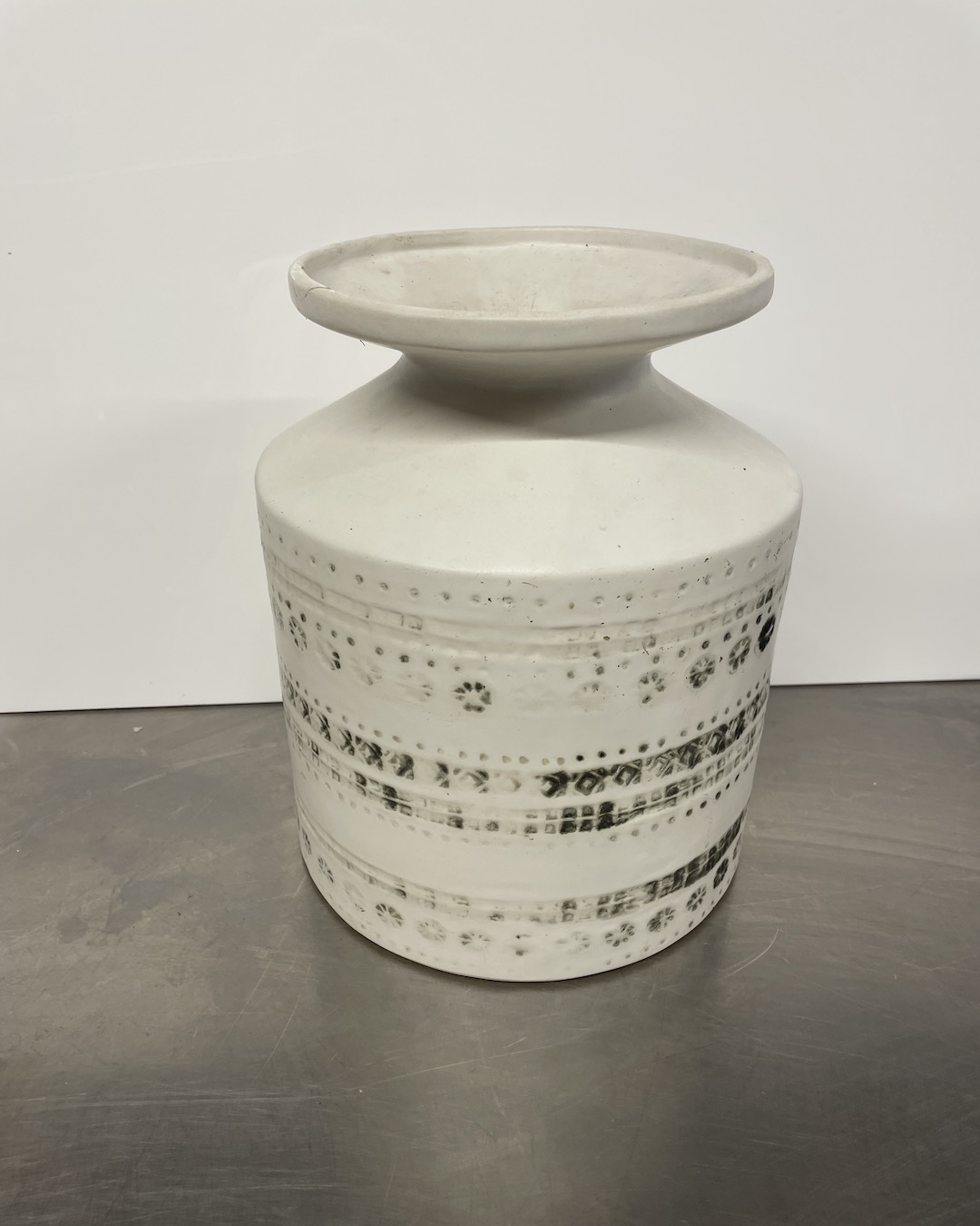 Green and white distressed vase