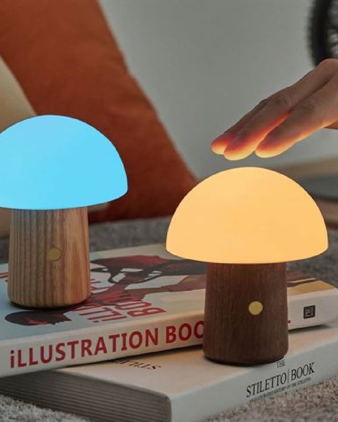 Mushroom lamps blue and yellow on books