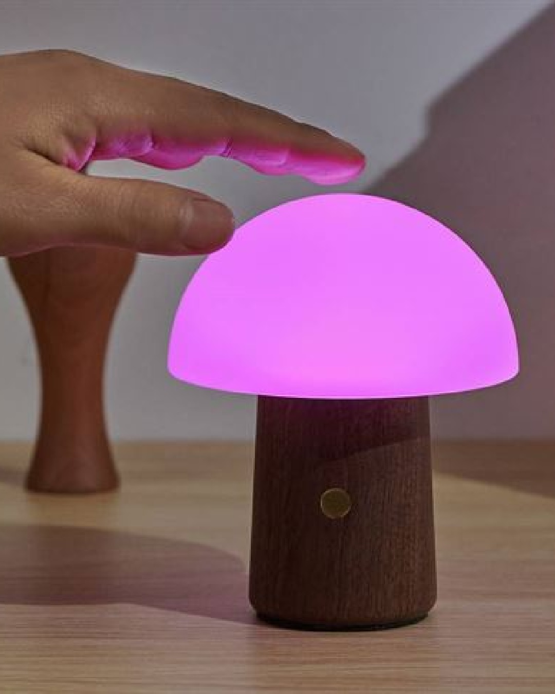 Mushroom lamp pink light on table