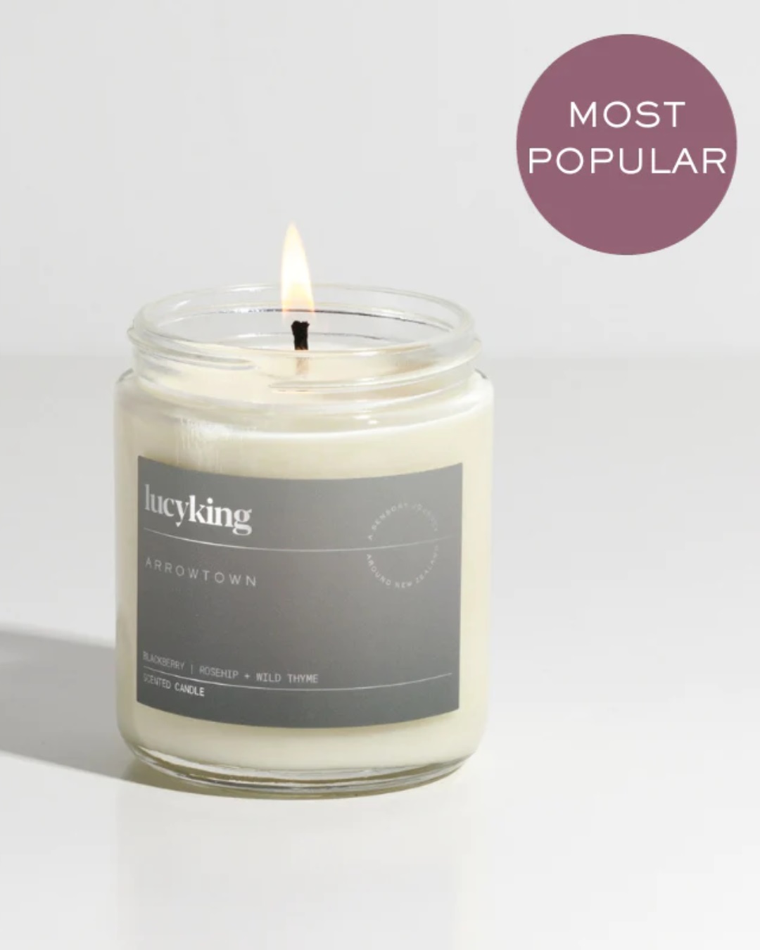 Glass jar candle with grey label