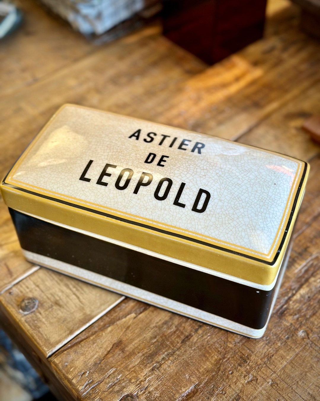 Astier de leopald box on wooden table