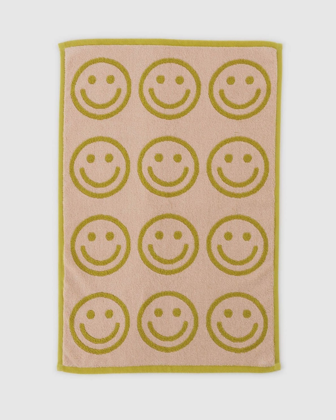 Smiley face pink and green hand towel