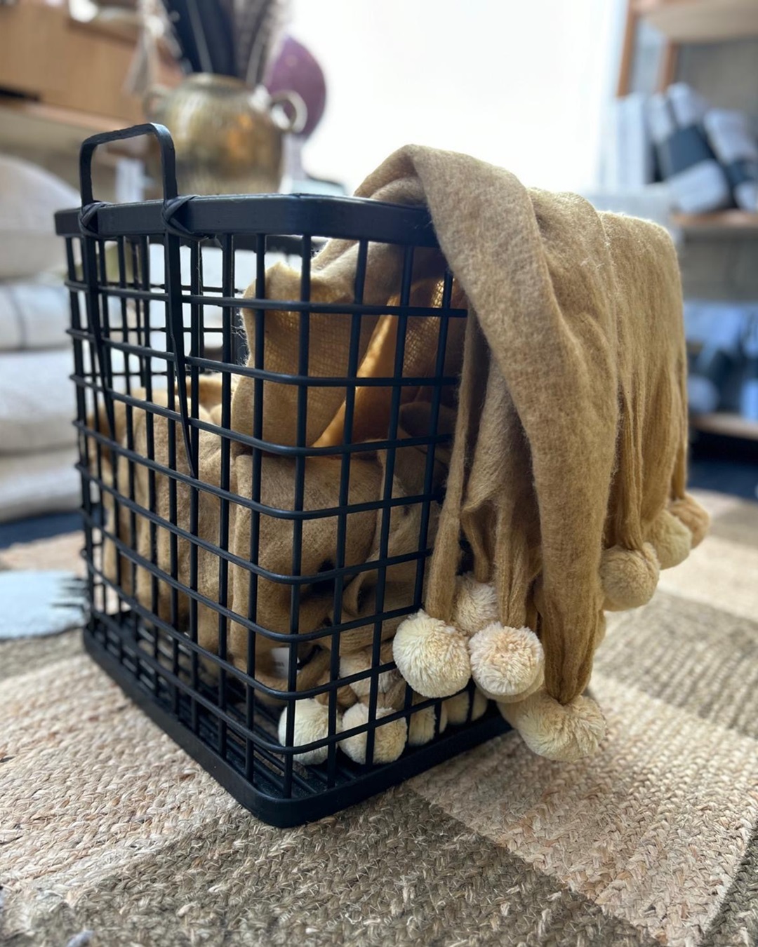Bamboo black basket with throw inside