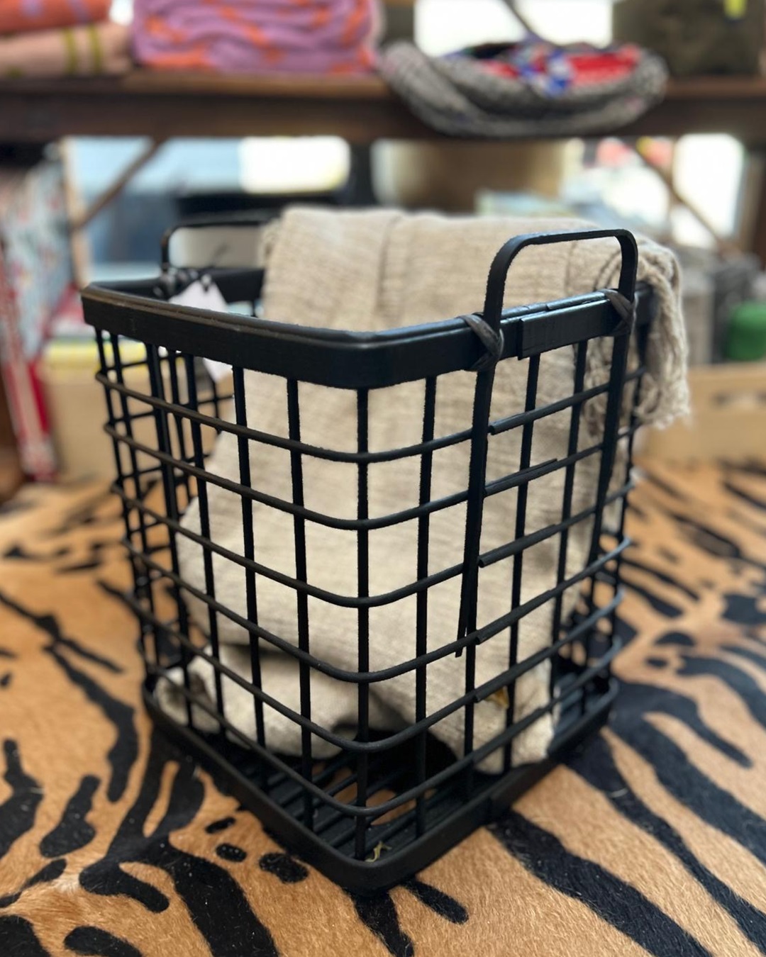 Bamboo black basket with throw inside