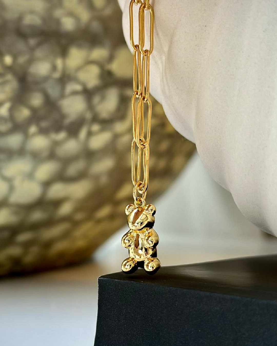 Teddy bear necklace on a gold plated chain