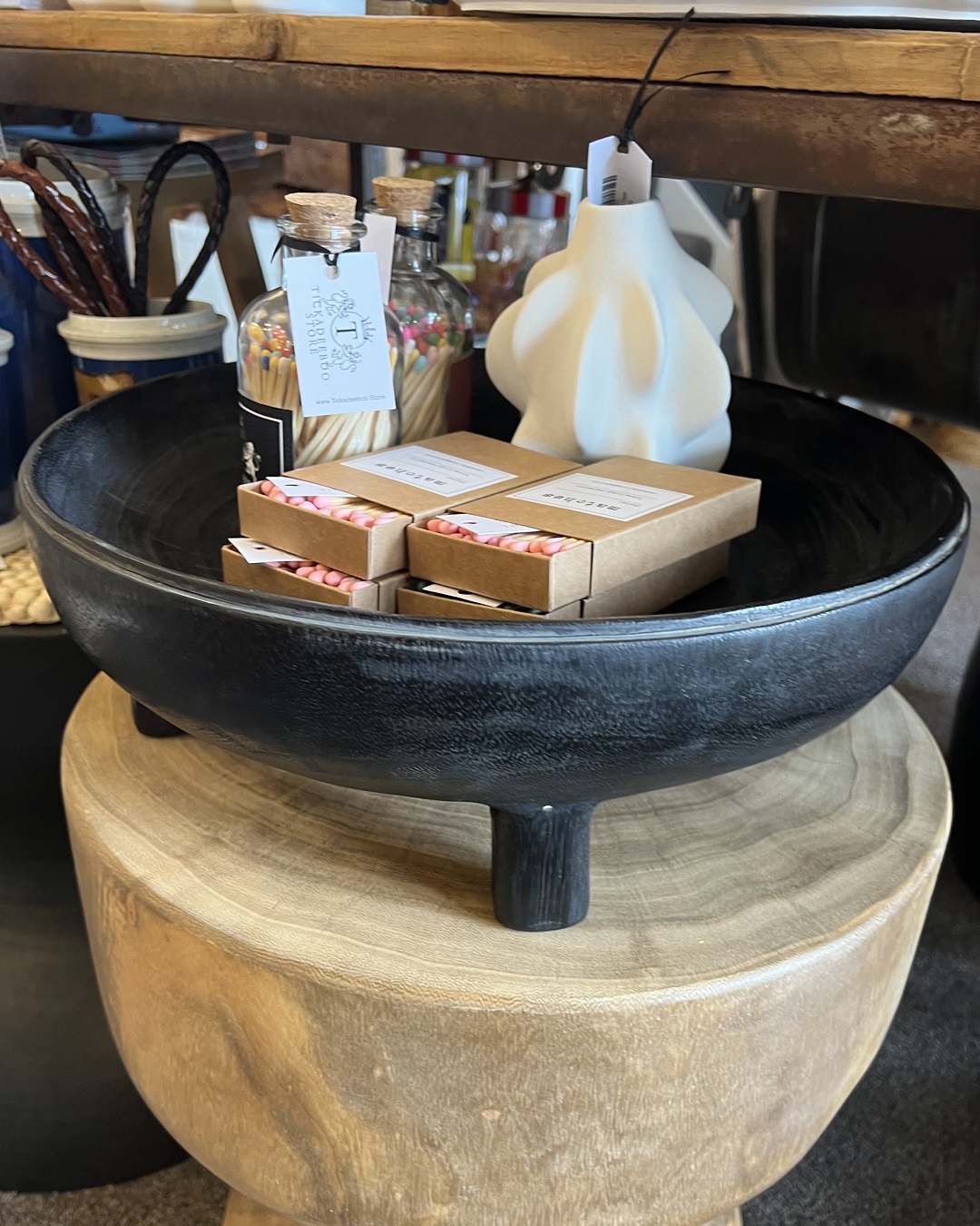 Black wooden bowl with feet