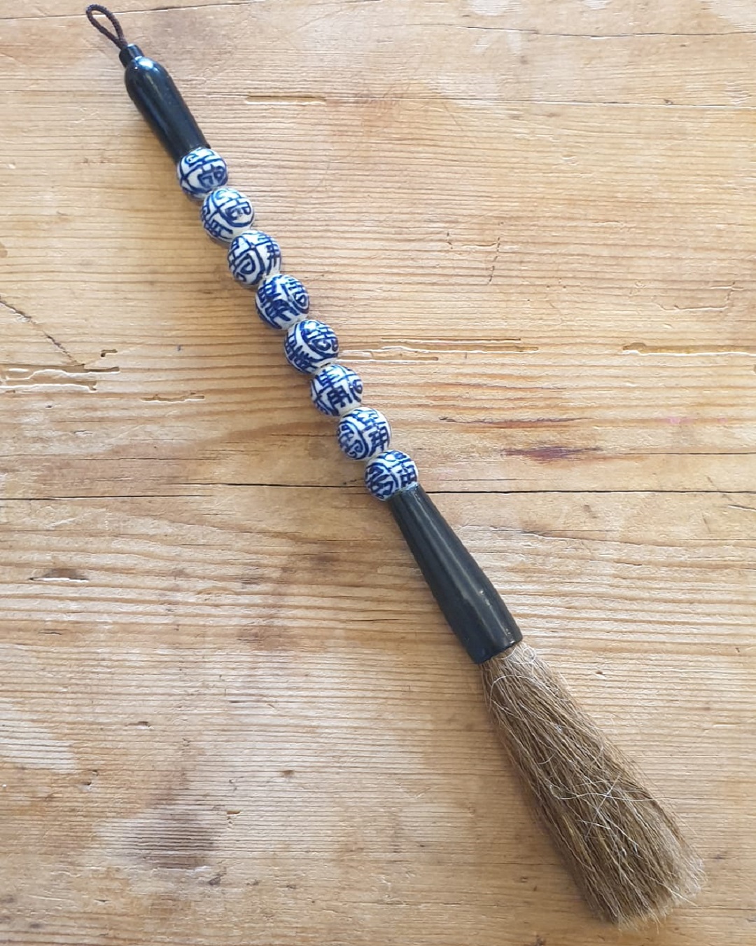 Blue and white decorative calligraphy brush