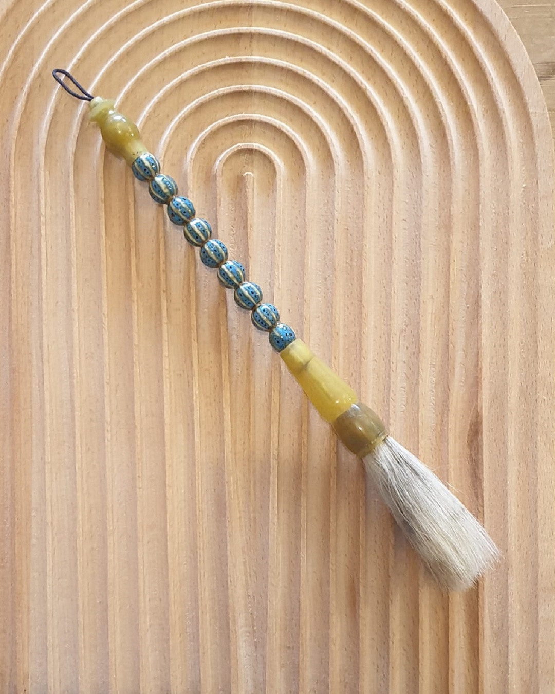 Blue calligraphy brush