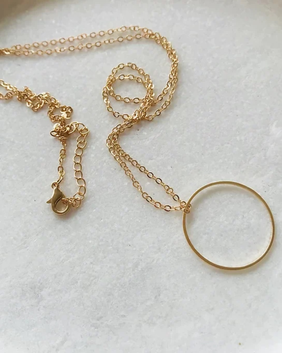 Gold circle necklaces on chain
