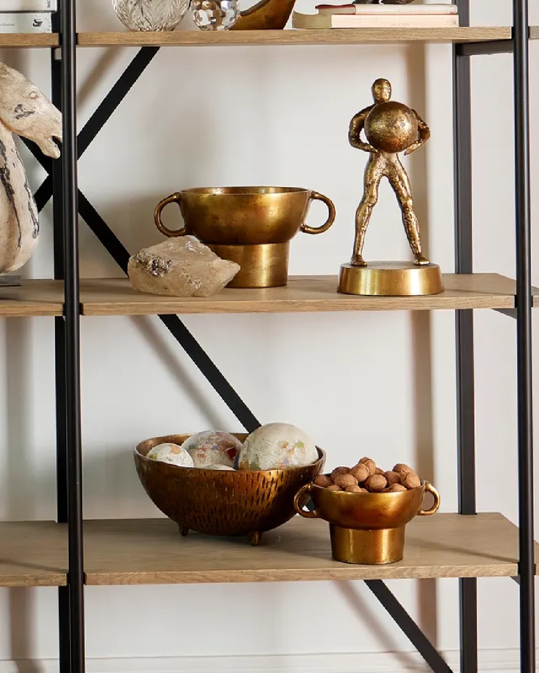 Display of urns and bowls on shelving