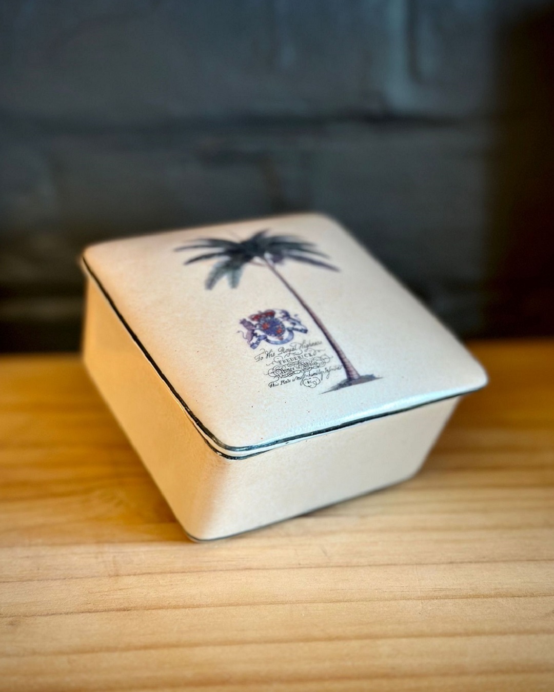 Palm tree box on wooden table