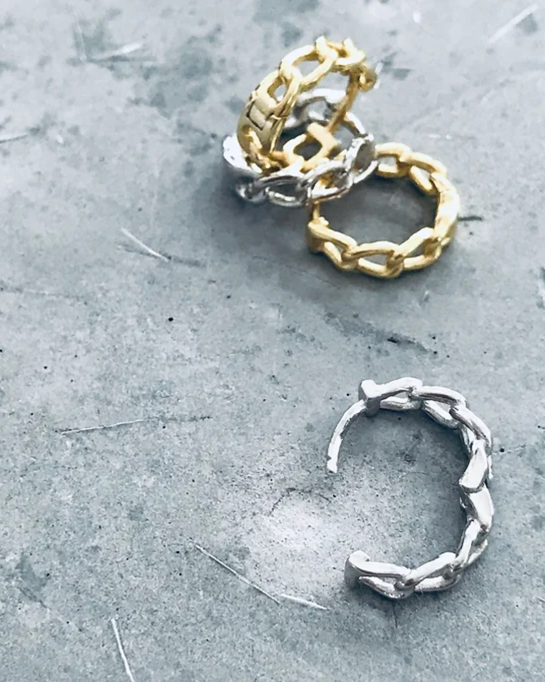 Chain sleeper earrings gold and silver