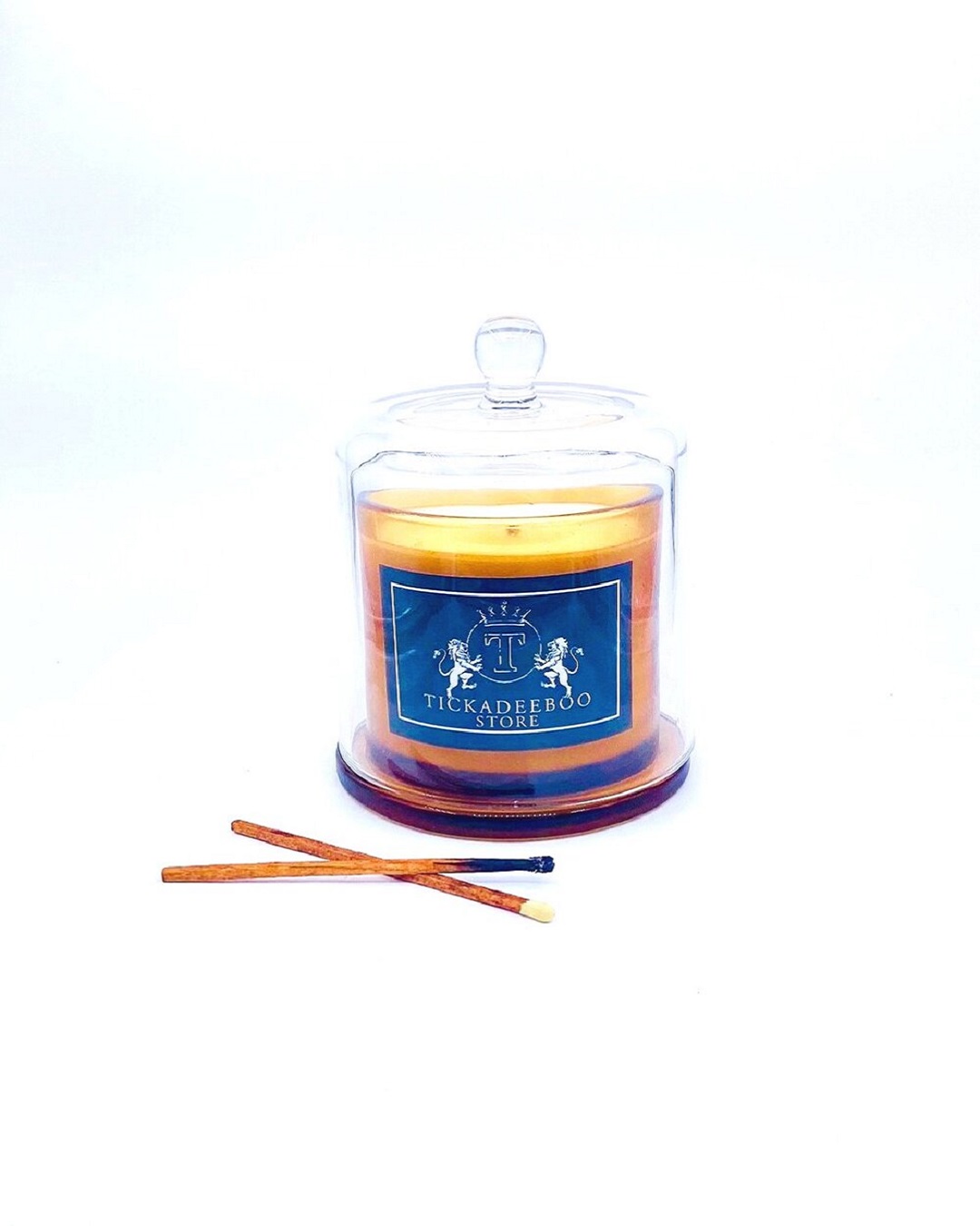 Amber cloche candle with matches