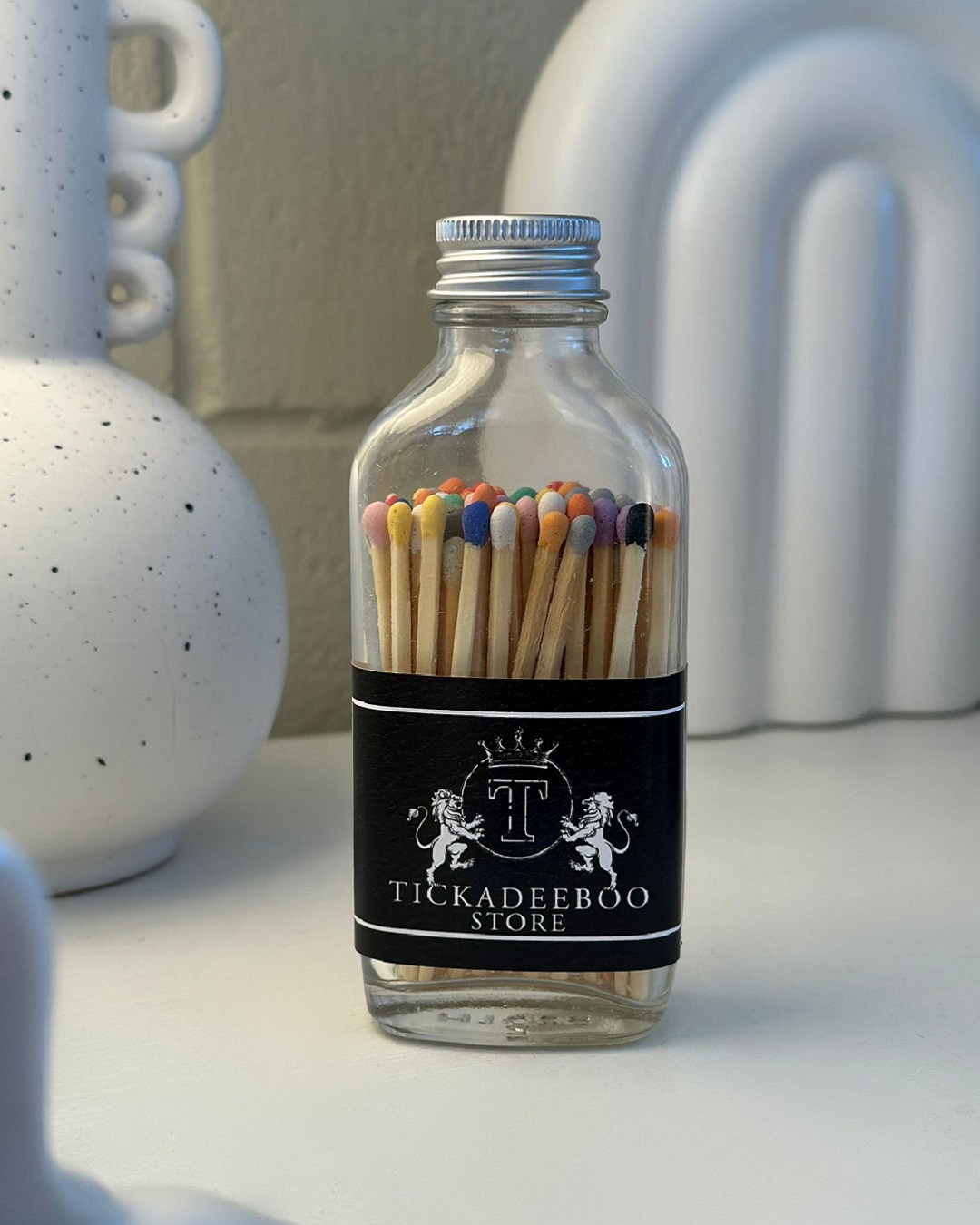 Coloured matches in a bottle with Tickadeeboo label
