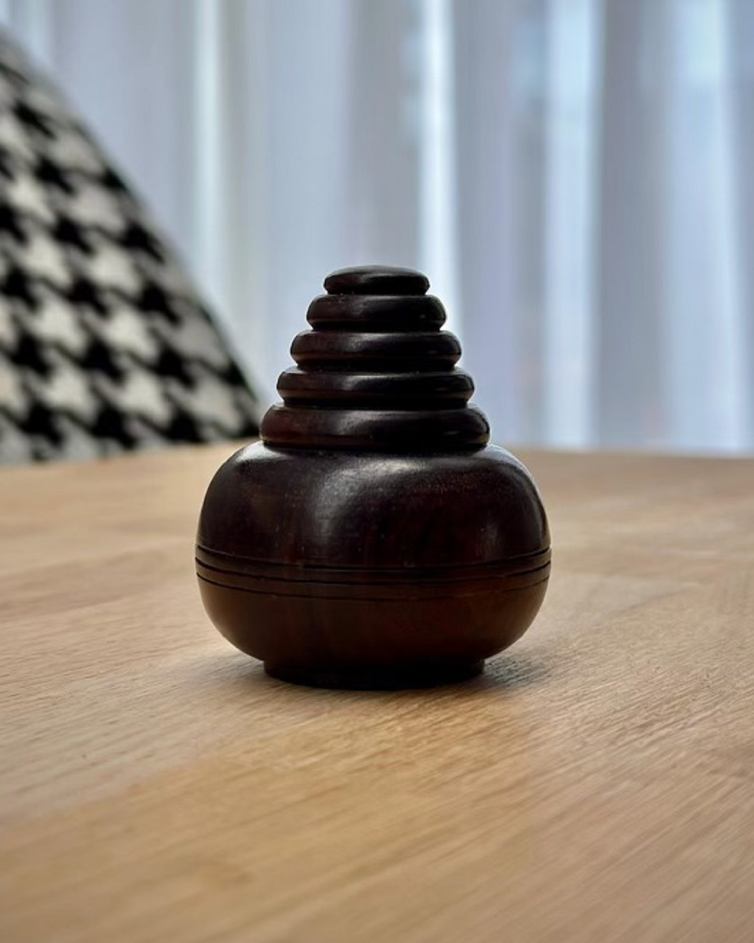 Wooden container hand woven on table