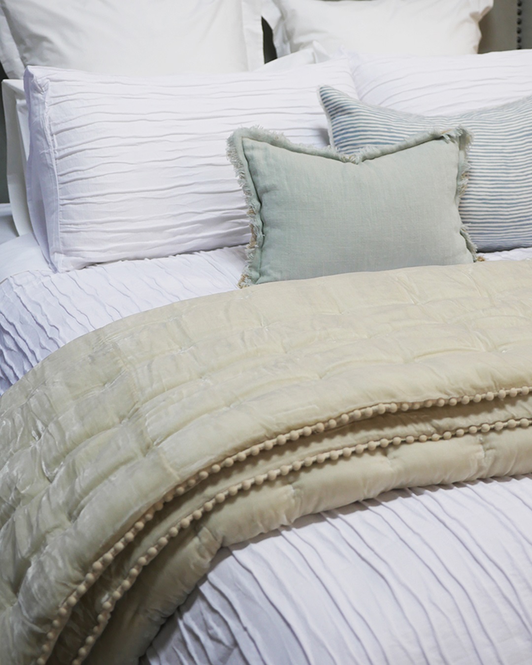 Natural Velvet coverlet on bed