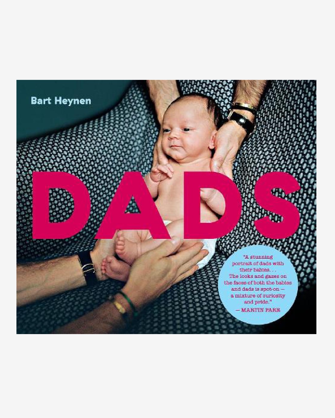 Baby on book that reads dads