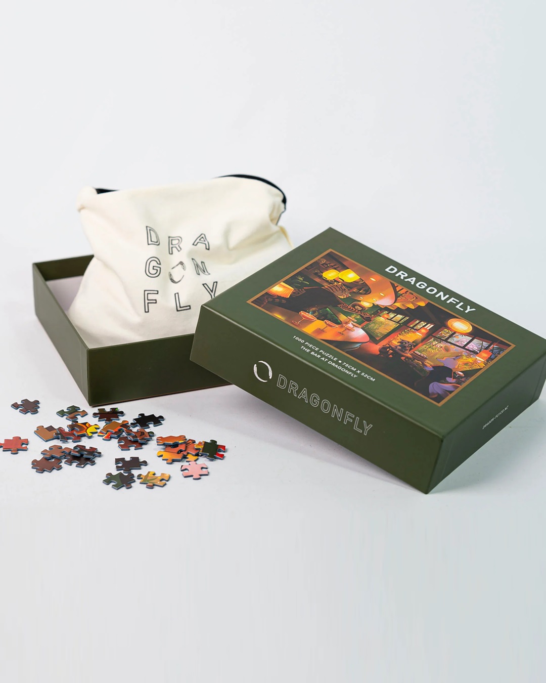 Dragonfly puzzle in box with bag and puzzle pieces