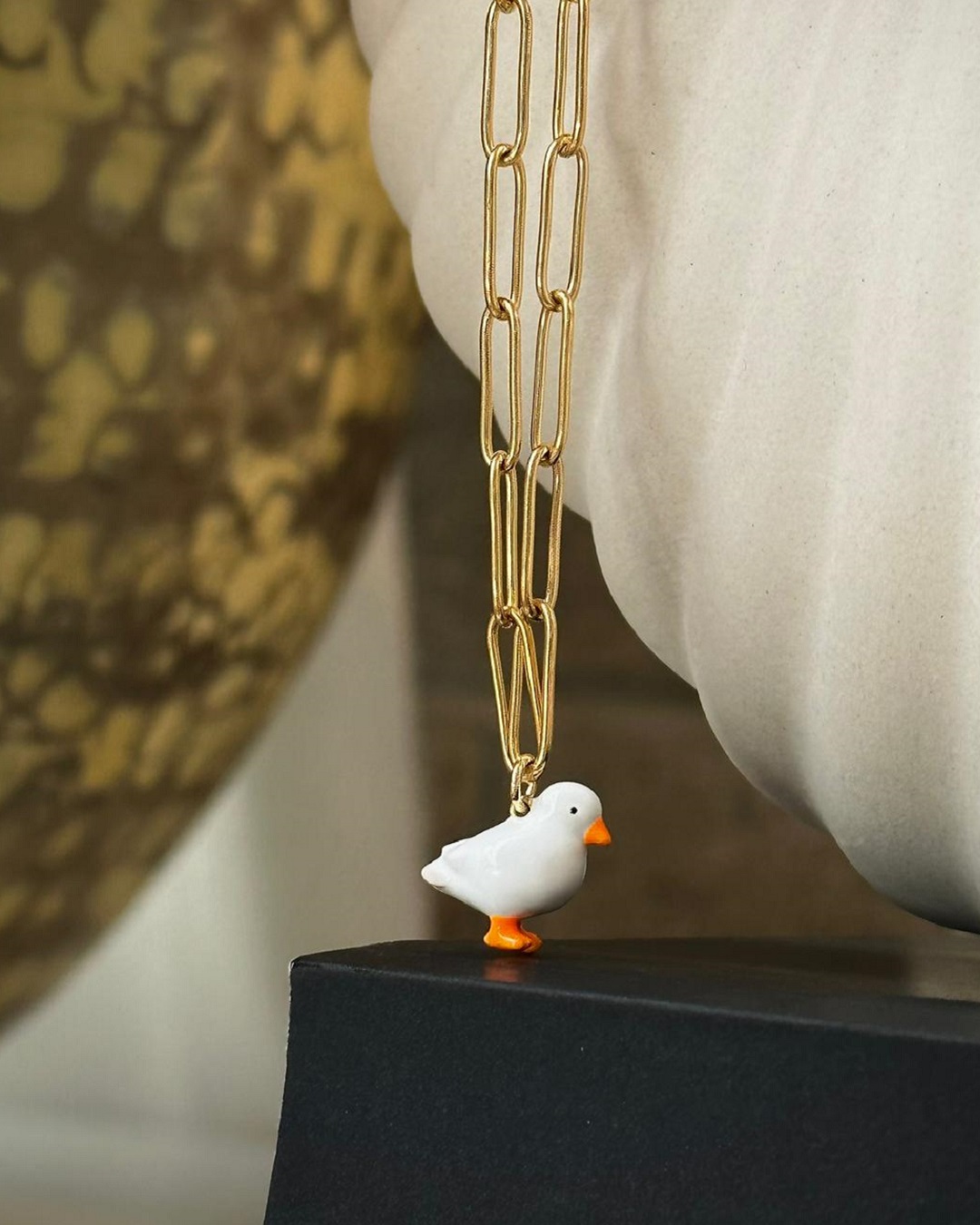 Duck necklace on a chain