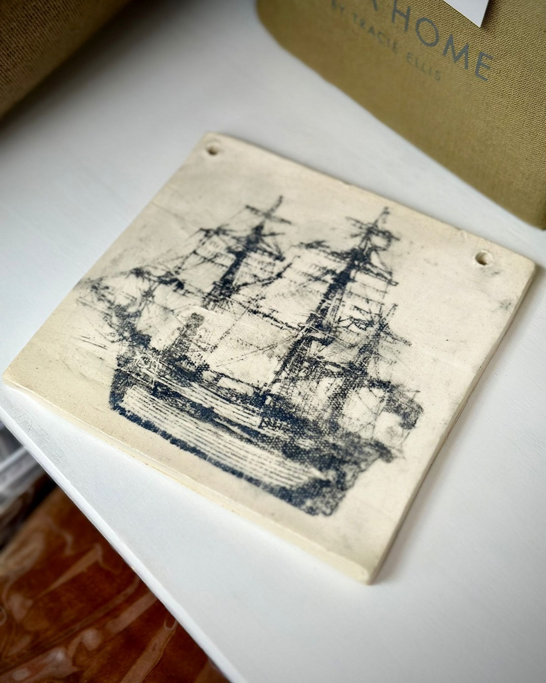 Wall tile with ship print on it