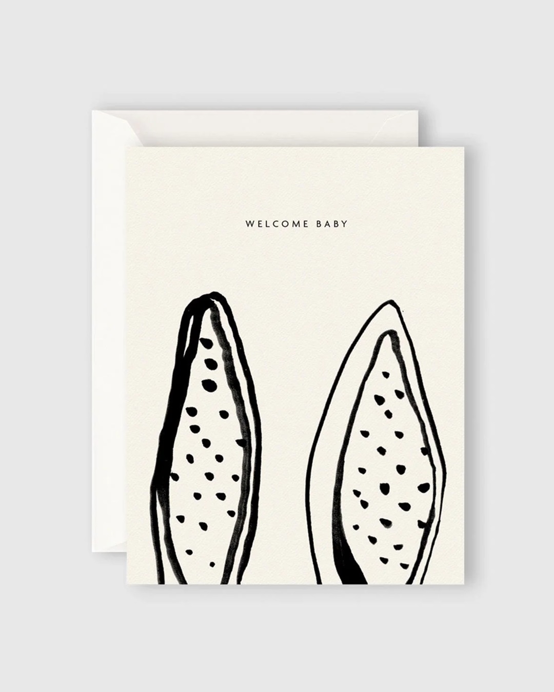 White card with black bunny ears and welcome baby text