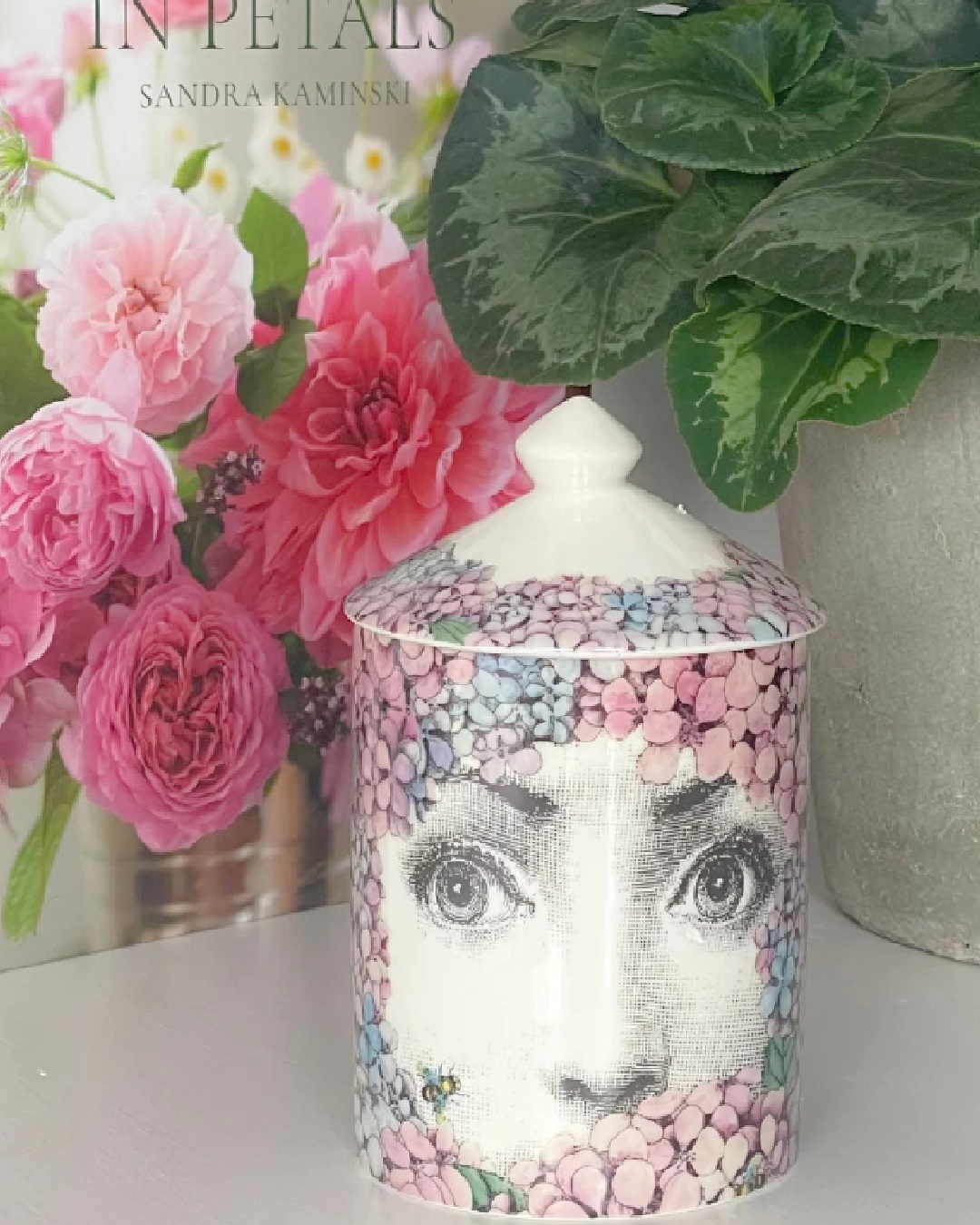 Face and flower candle jar