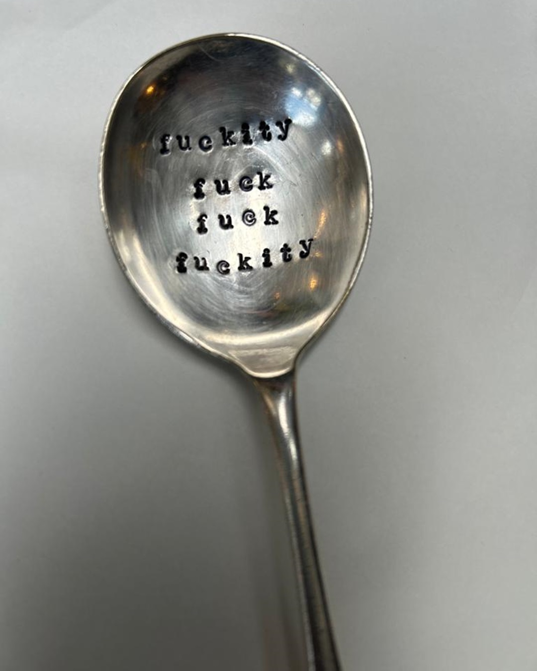 Silver stamped spoon fuckity fuck