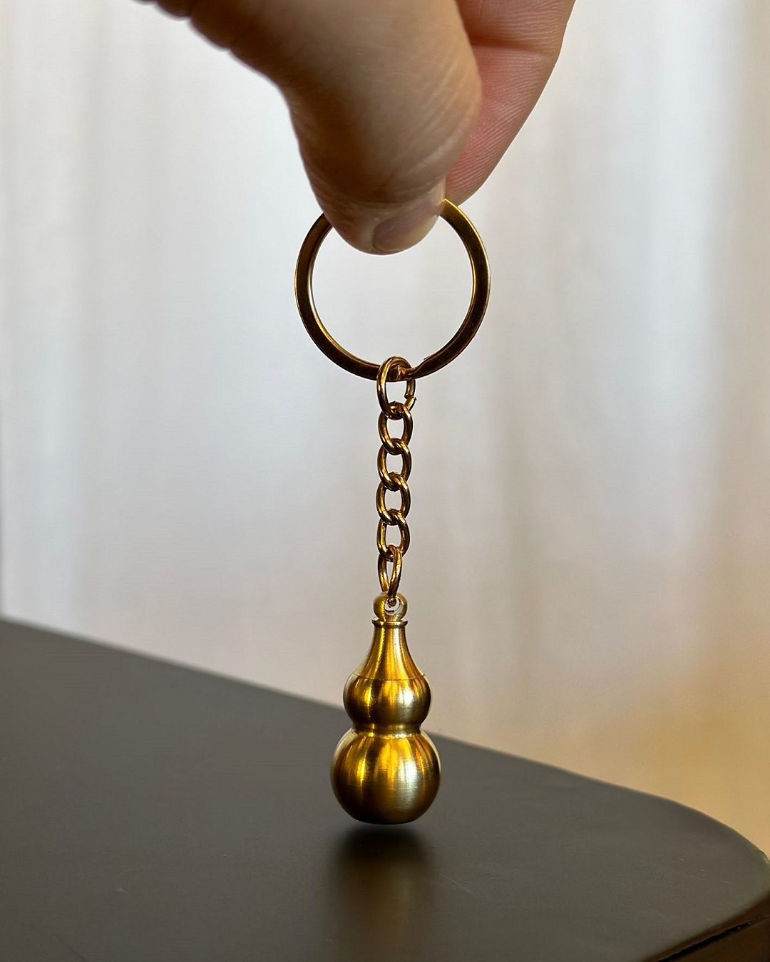 Gold genie bottle keyring