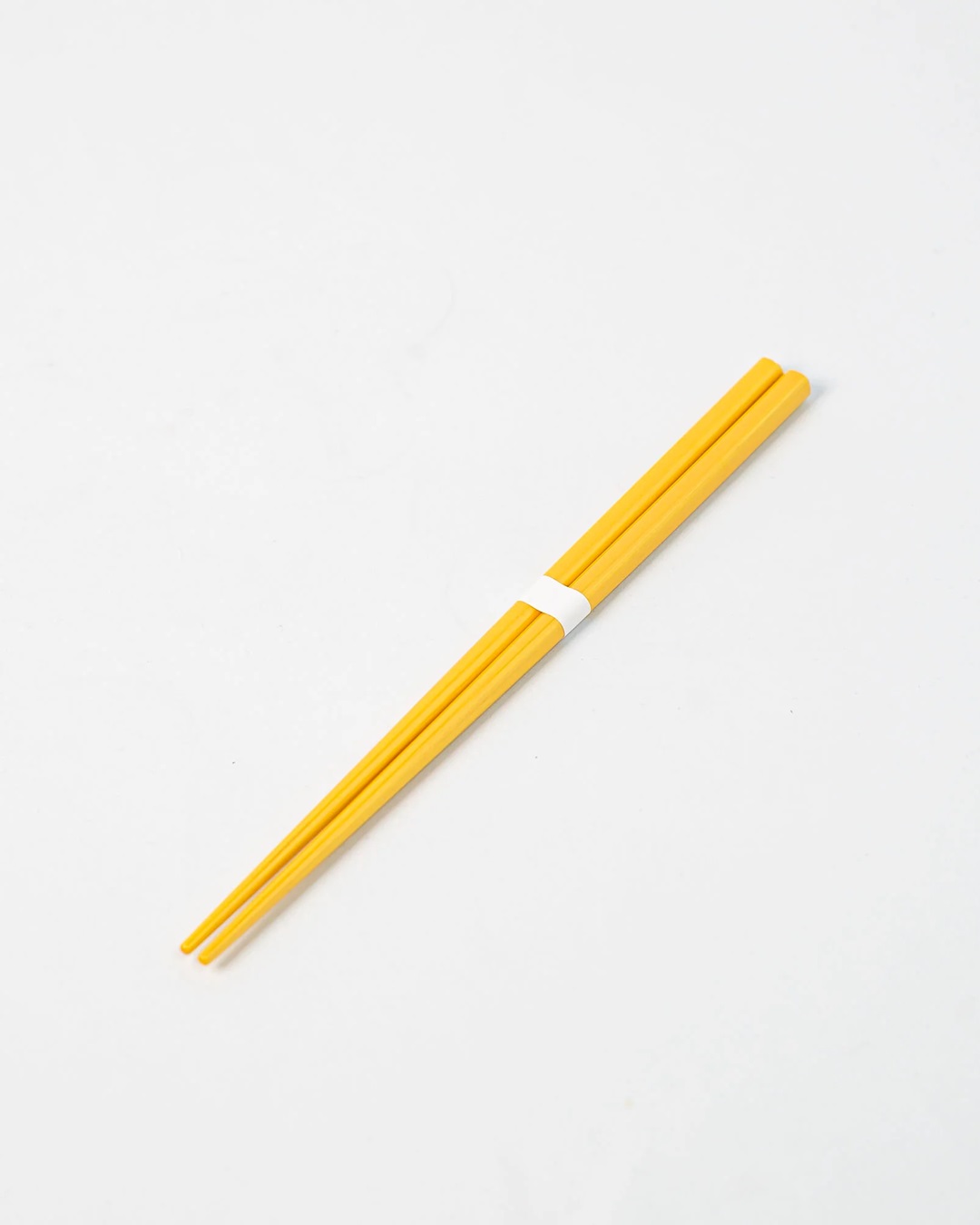 gold and white chopsticks