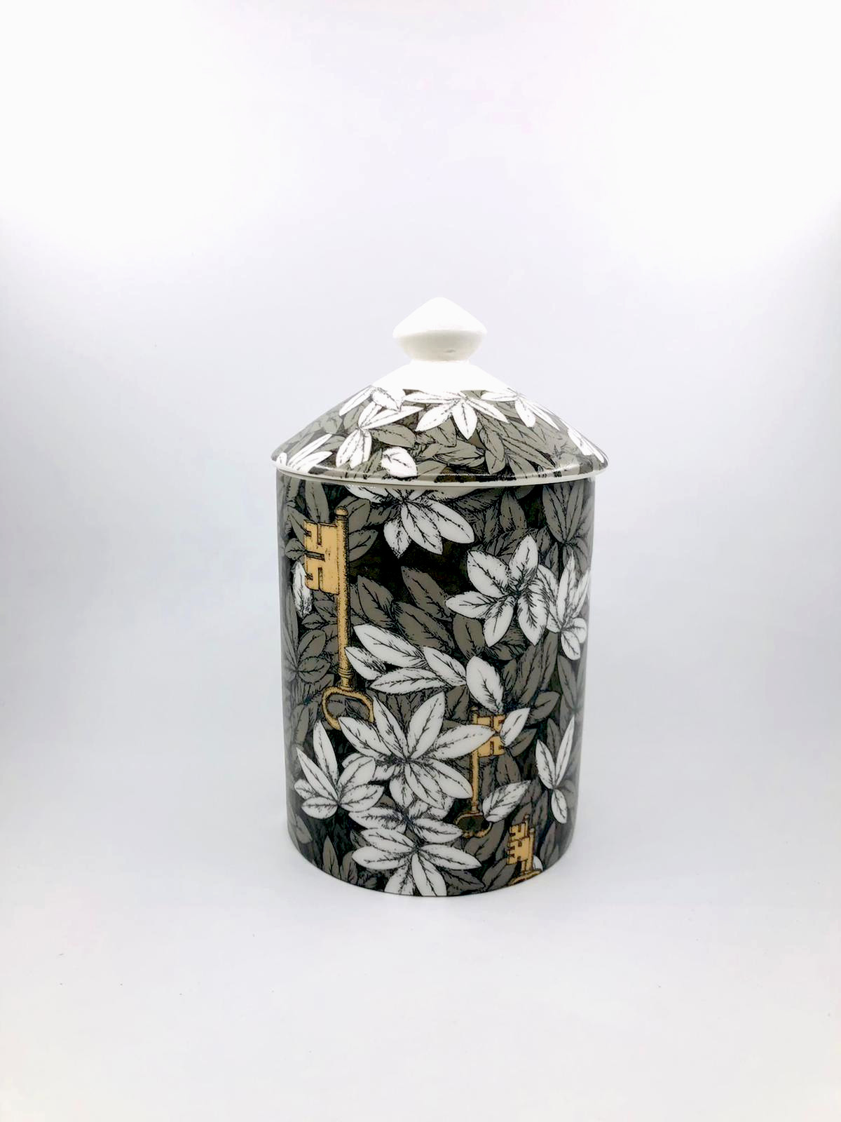 Gold key and flower candle jar