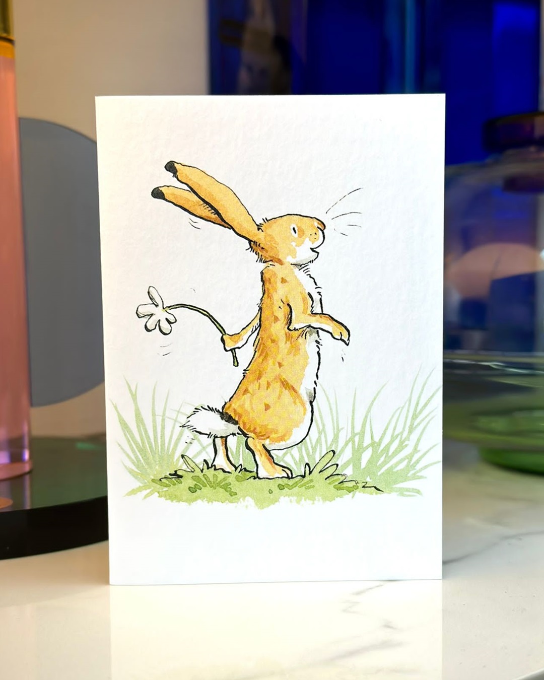 Bunny holding flower card