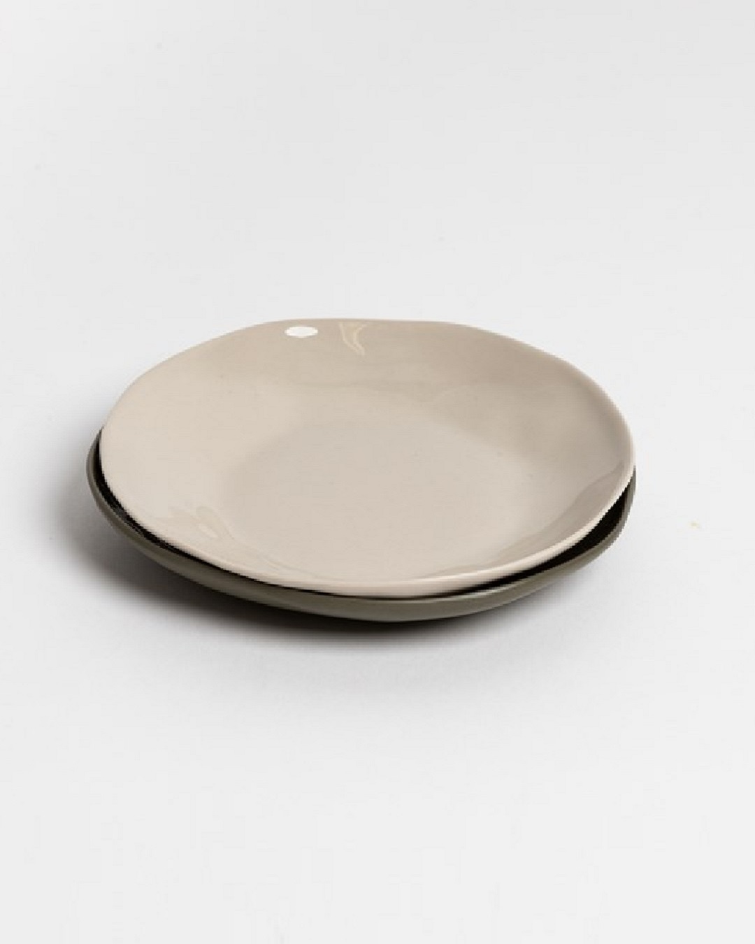 Cashmere plate on top of olive plate