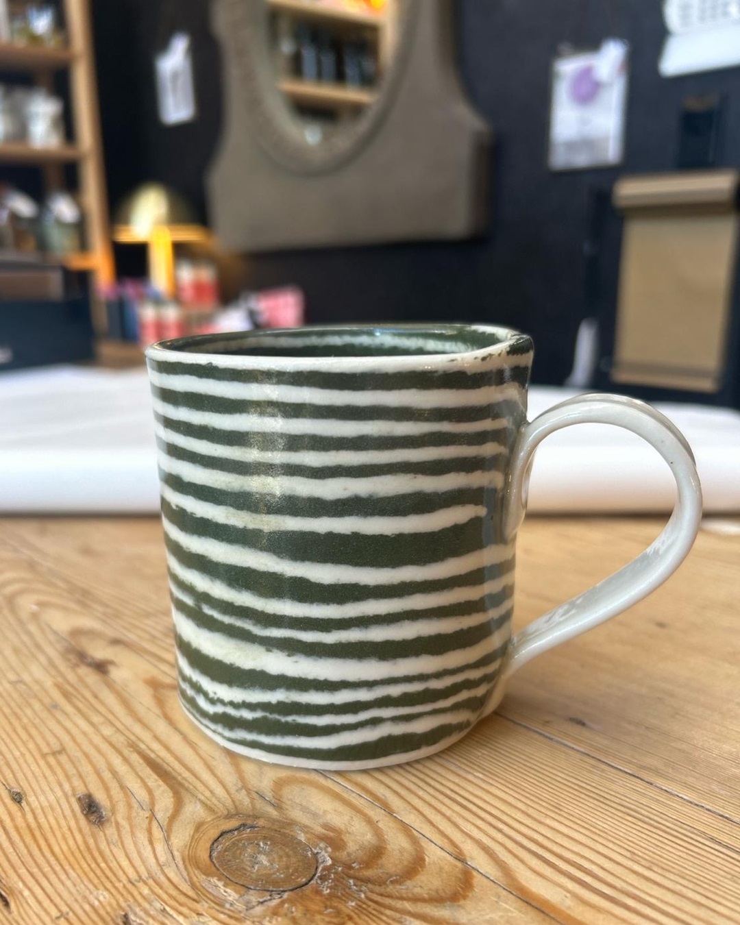 Large dark green striped mug