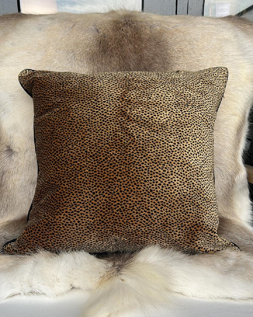 Leopard cushion cover on skin