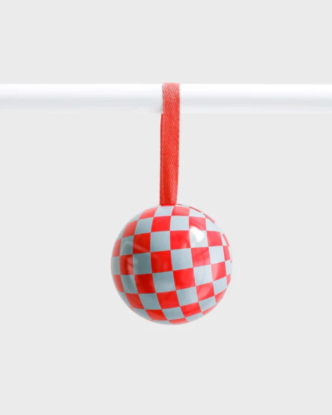 Bauble red and blue checked hanging on pole