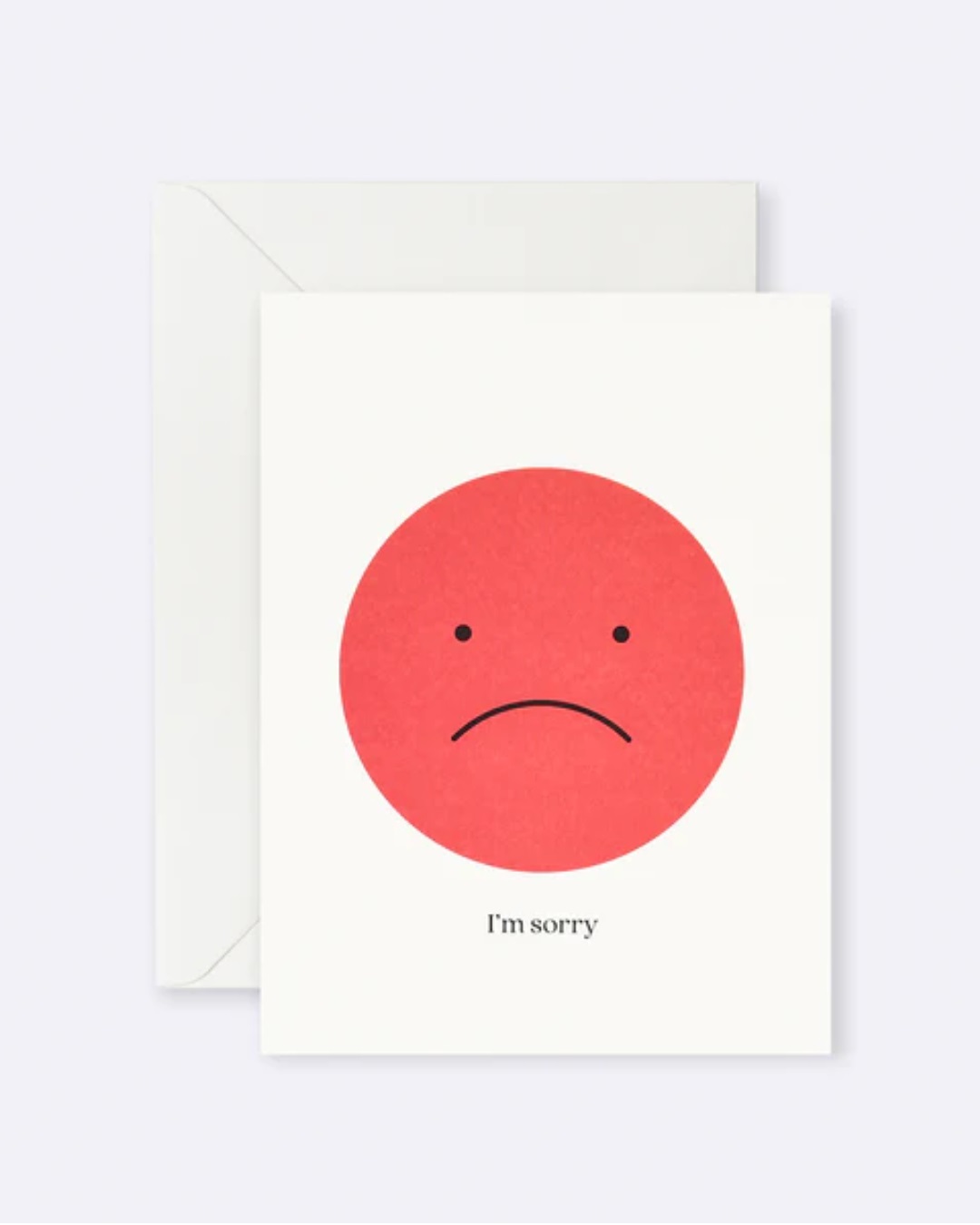 White card with pink sad face and I'm sorry on it