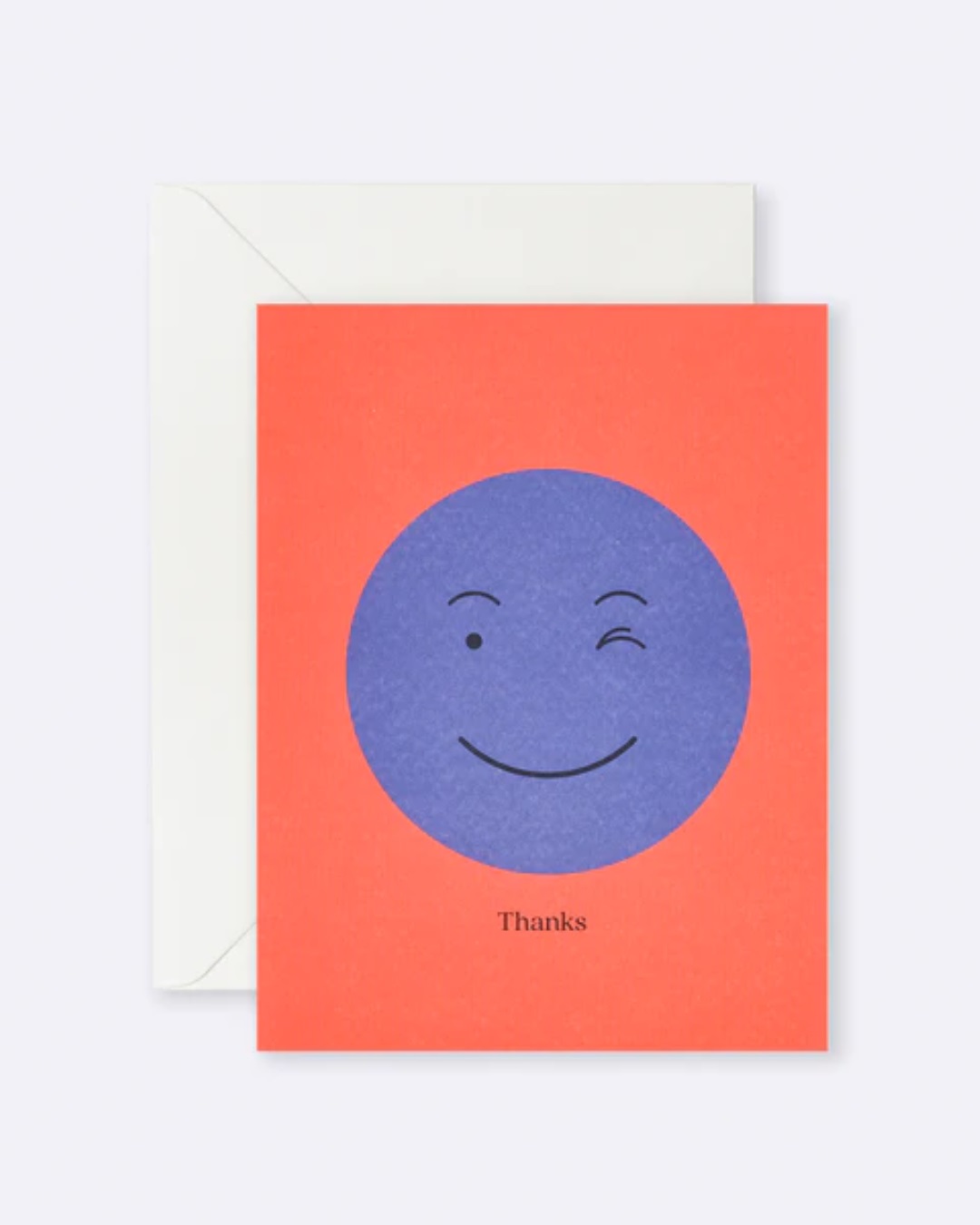 Orange card with blue wink face and thanks on it