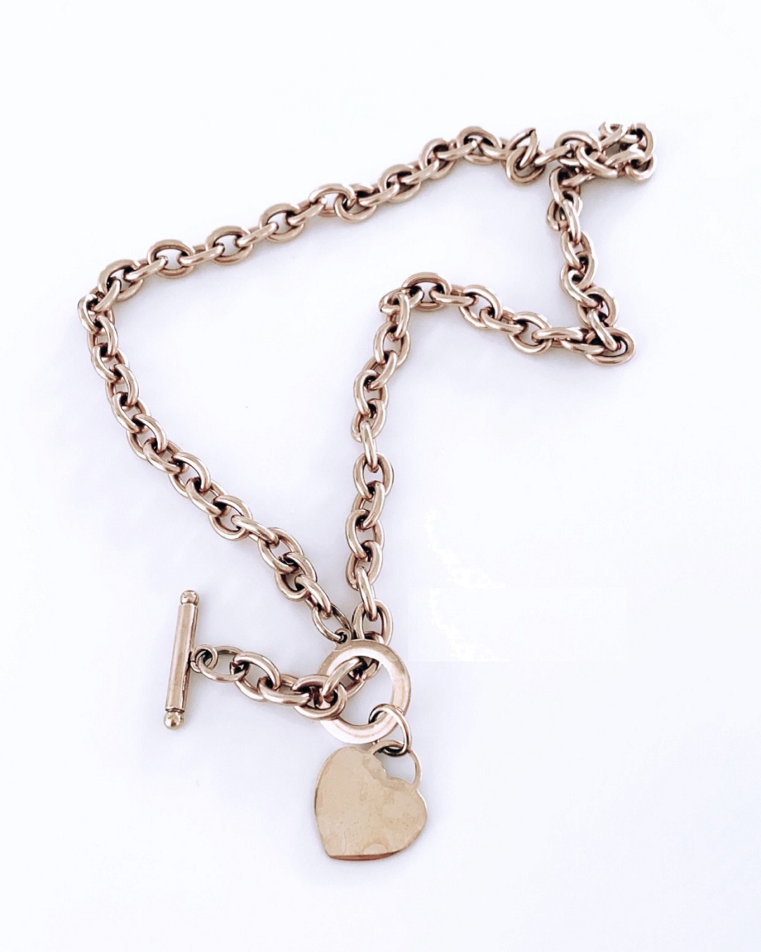 Gold chain necklace with heart