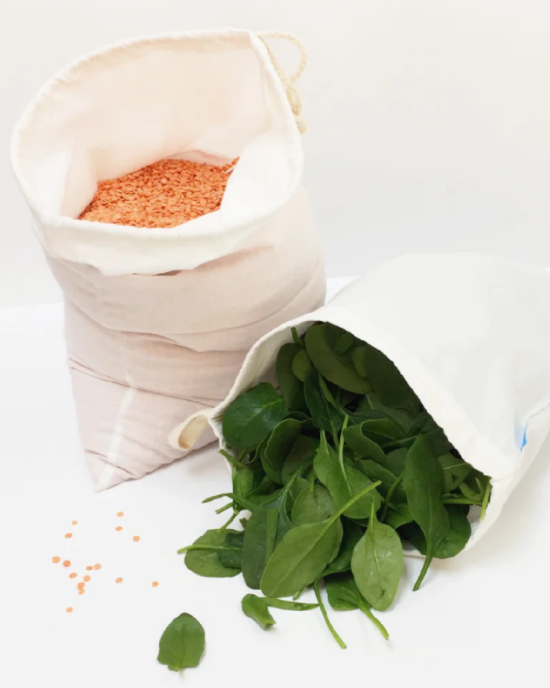 Loot bags with grain and spinach in