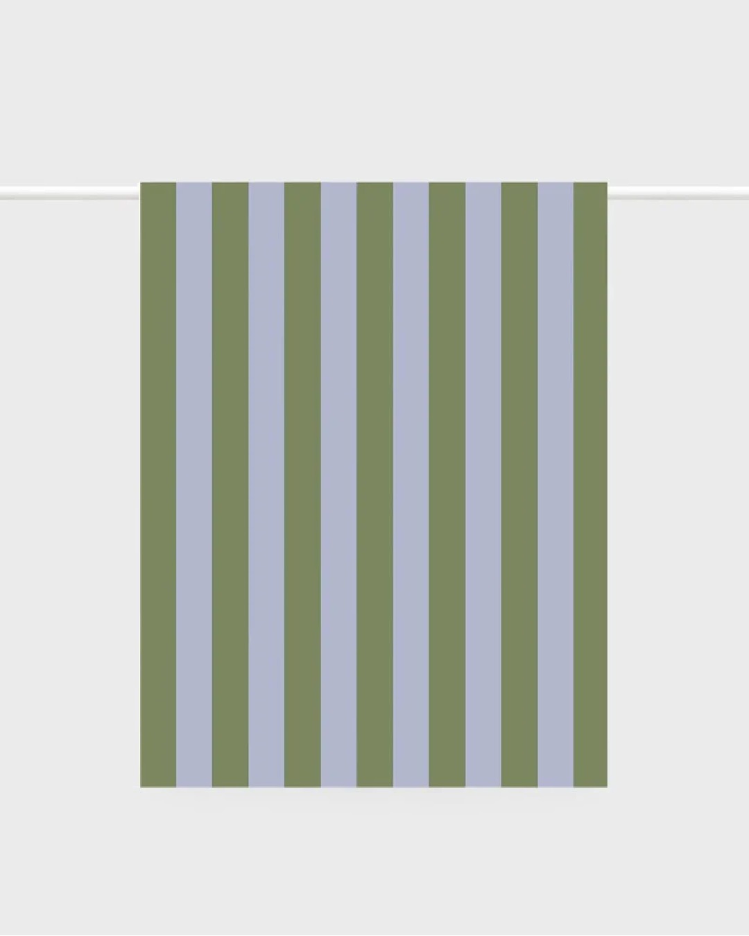 blue and green stripe tea towel hanging on a rail