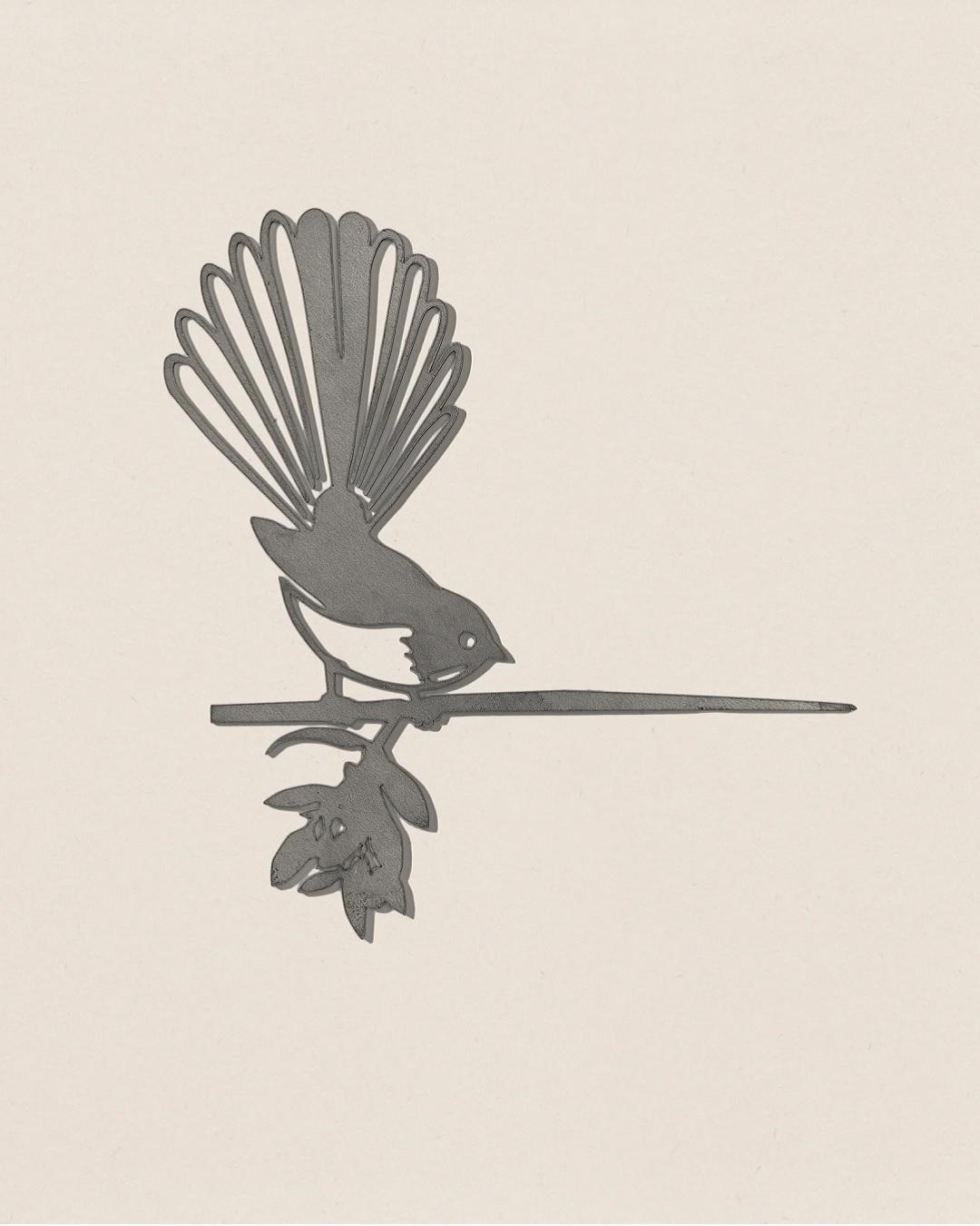 Metal piwakawaka shaped bird