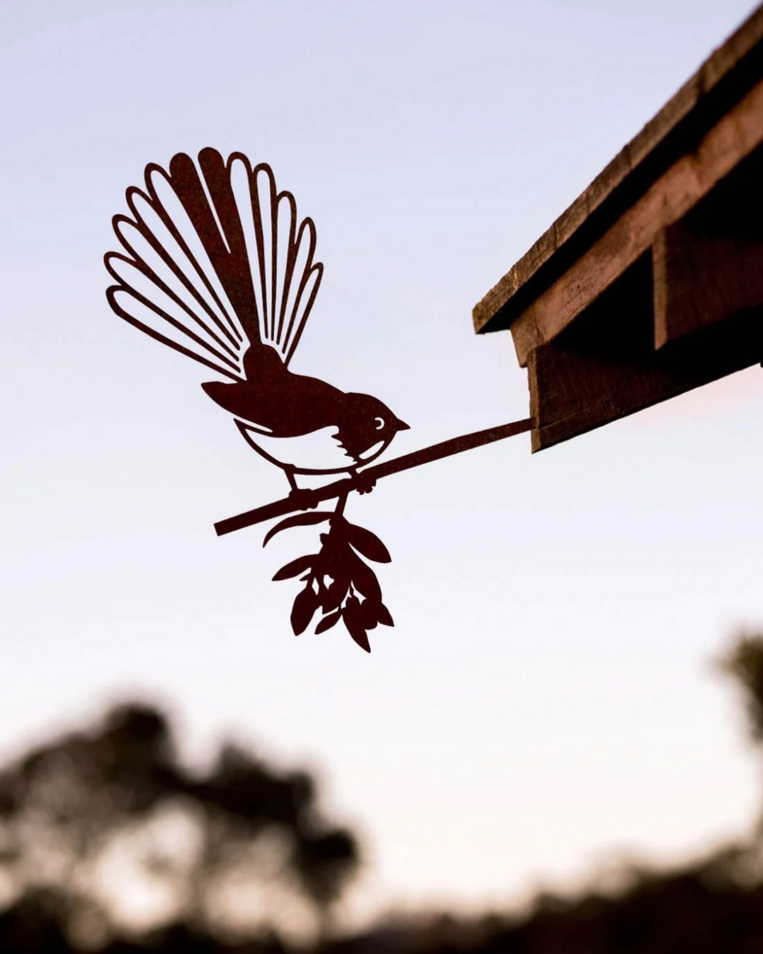 Metal piwakawaka shaped bird