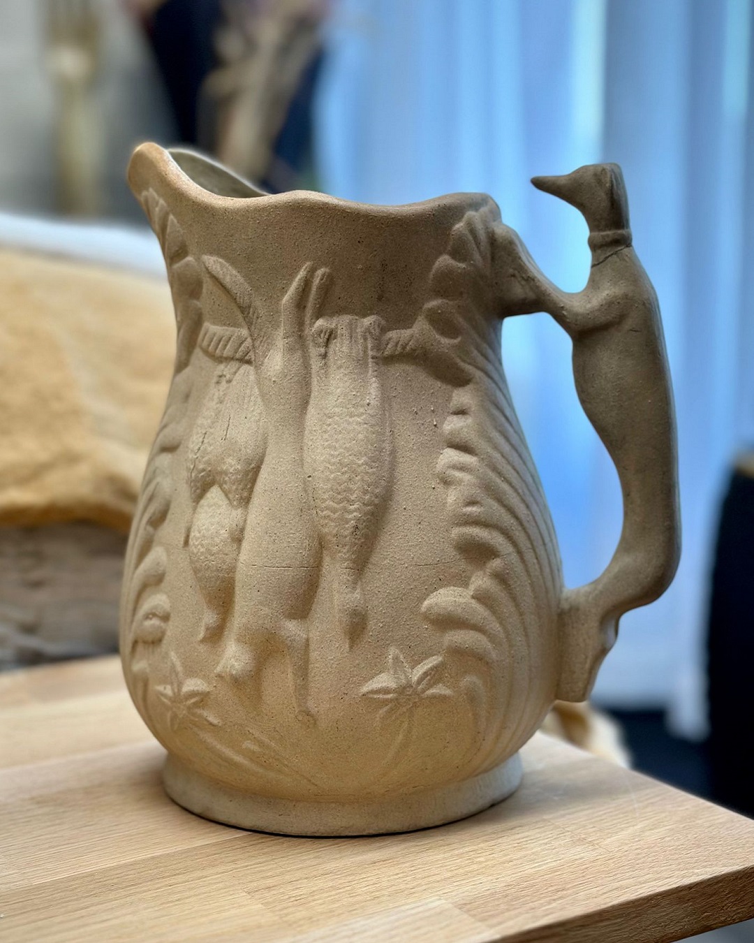 Pottery jug on table