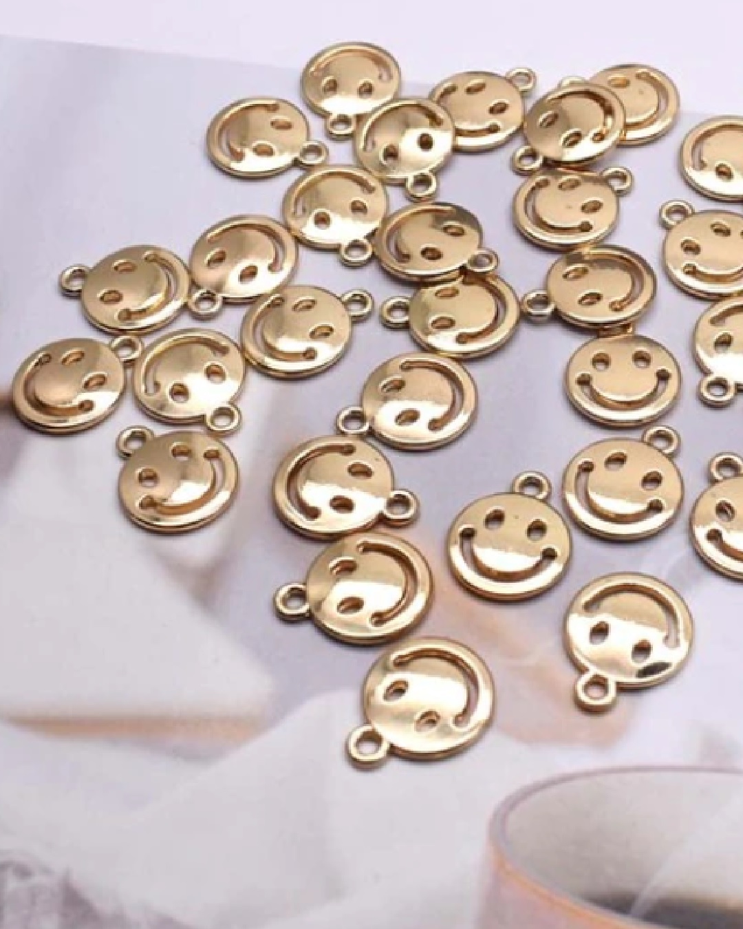 Smiley face charms
