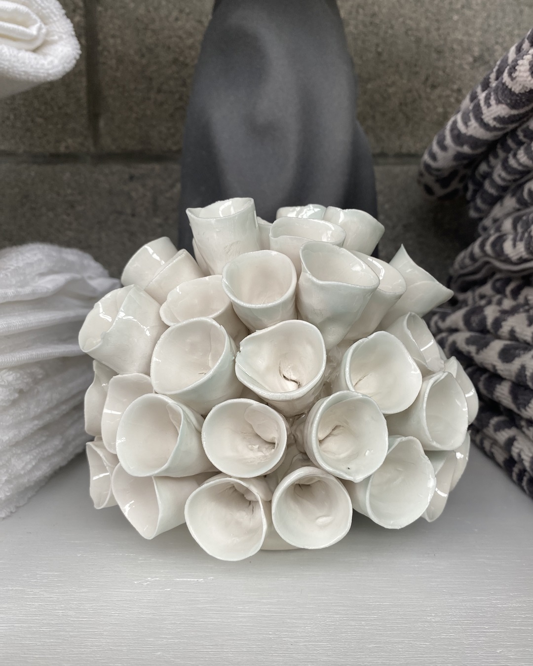 Ceramic white coral display item on shelf