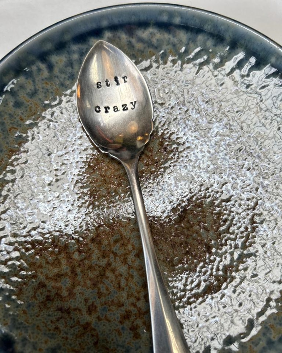 Silver stamped spoon stir crazy