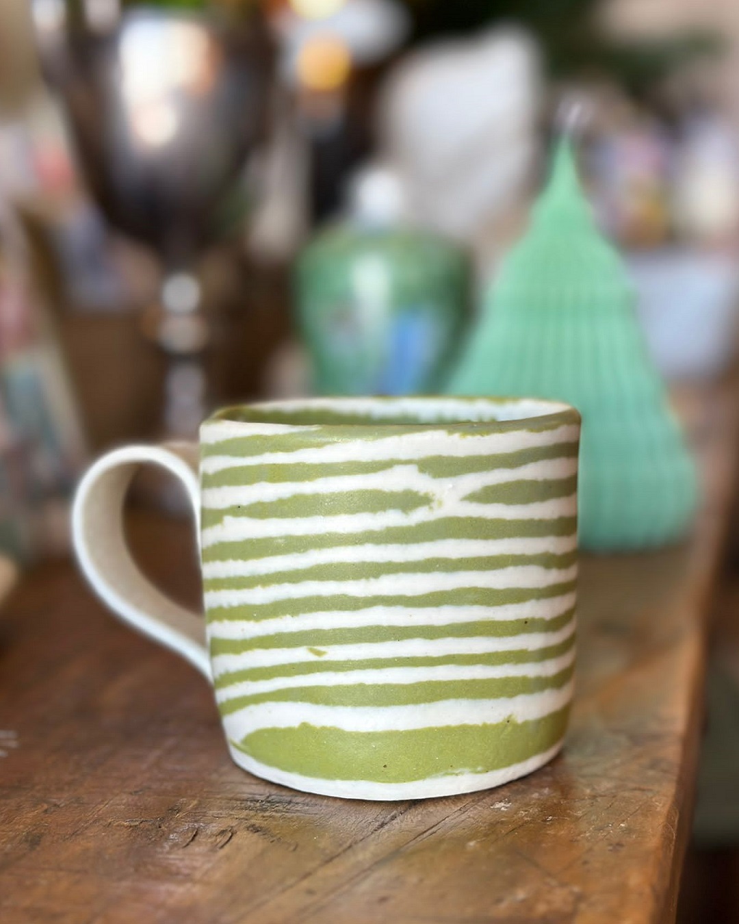 Green striped ceramic mug