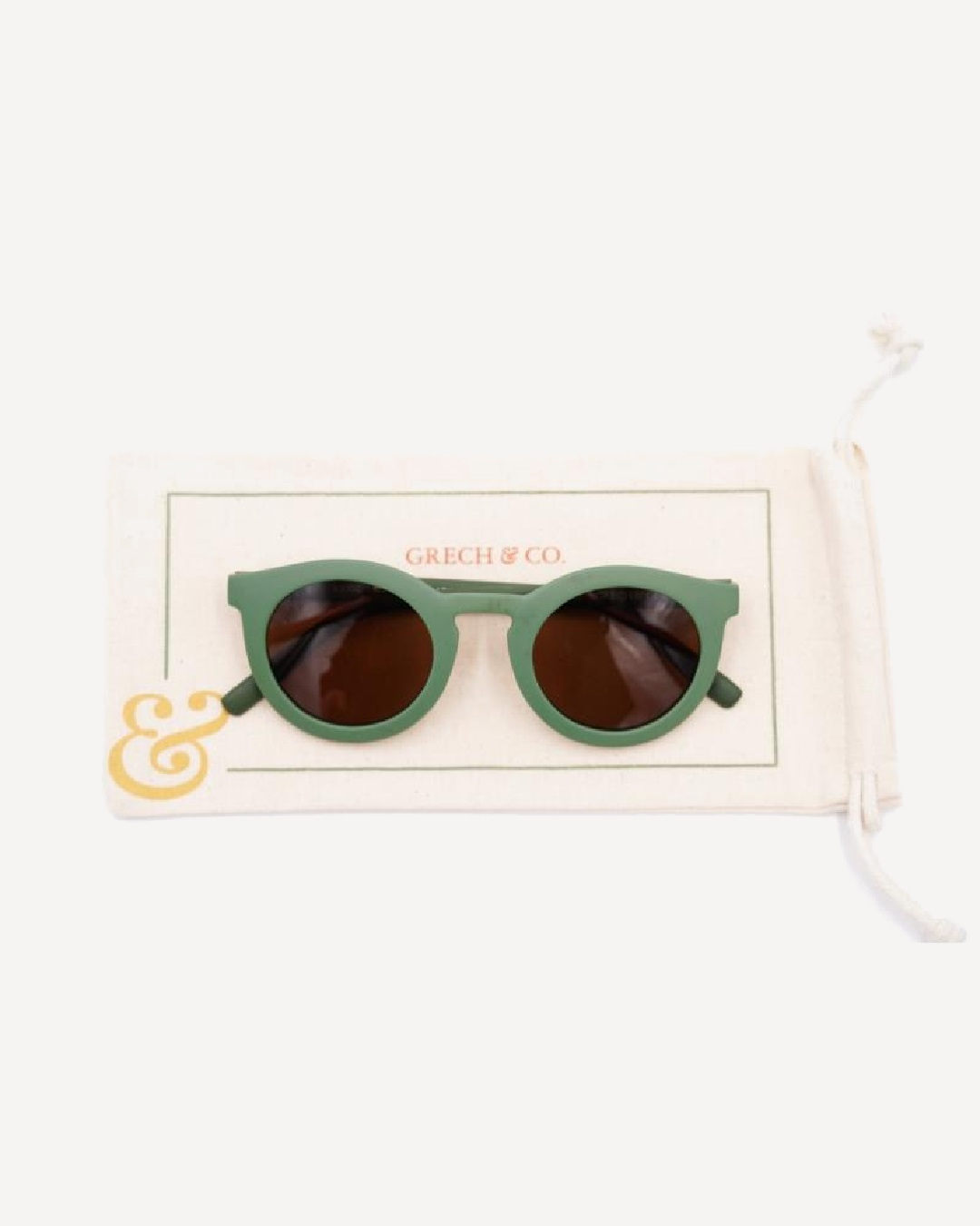 Green sunglasses on sunglass fabric case