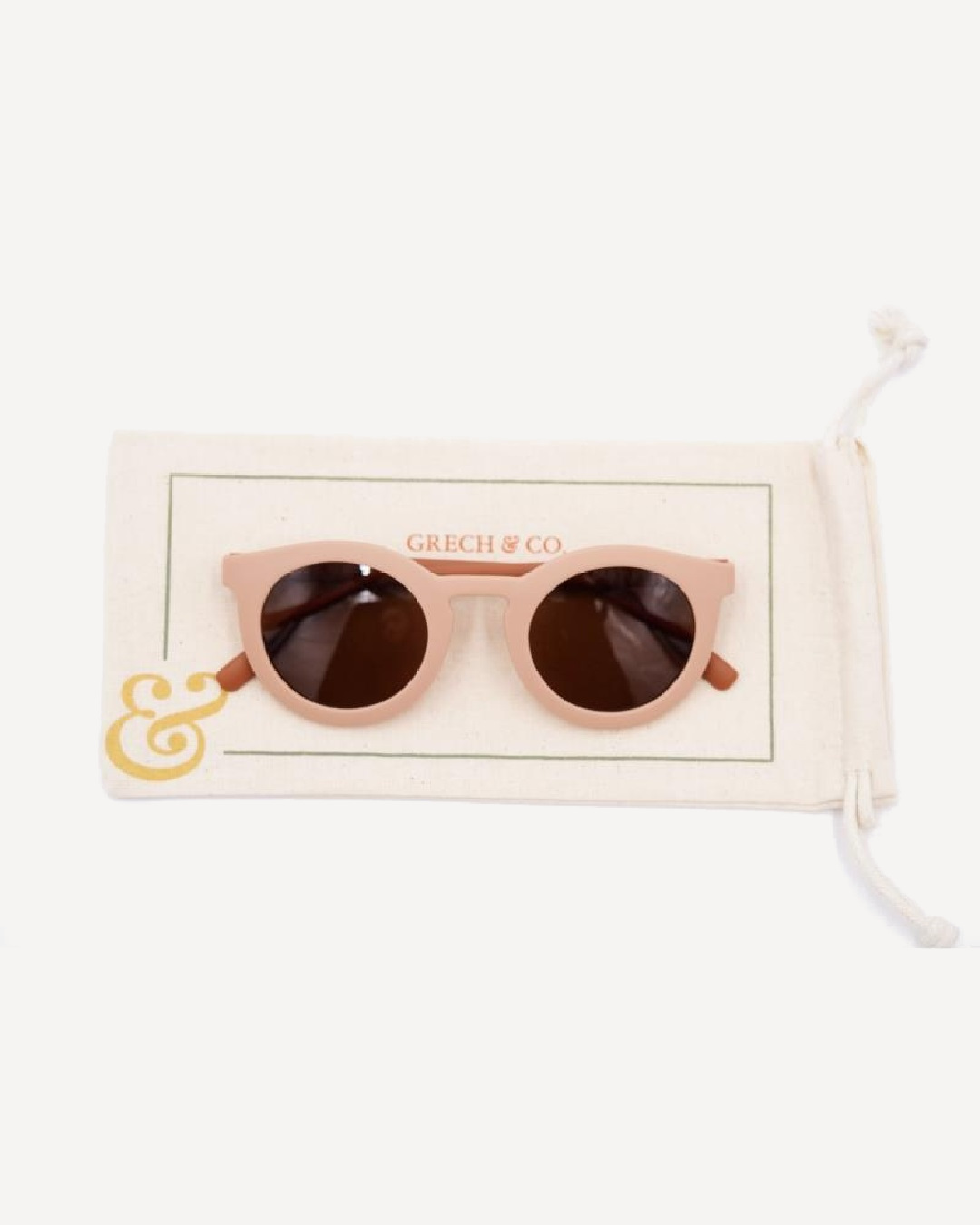 Pink sunglasses on sunglass fabric case