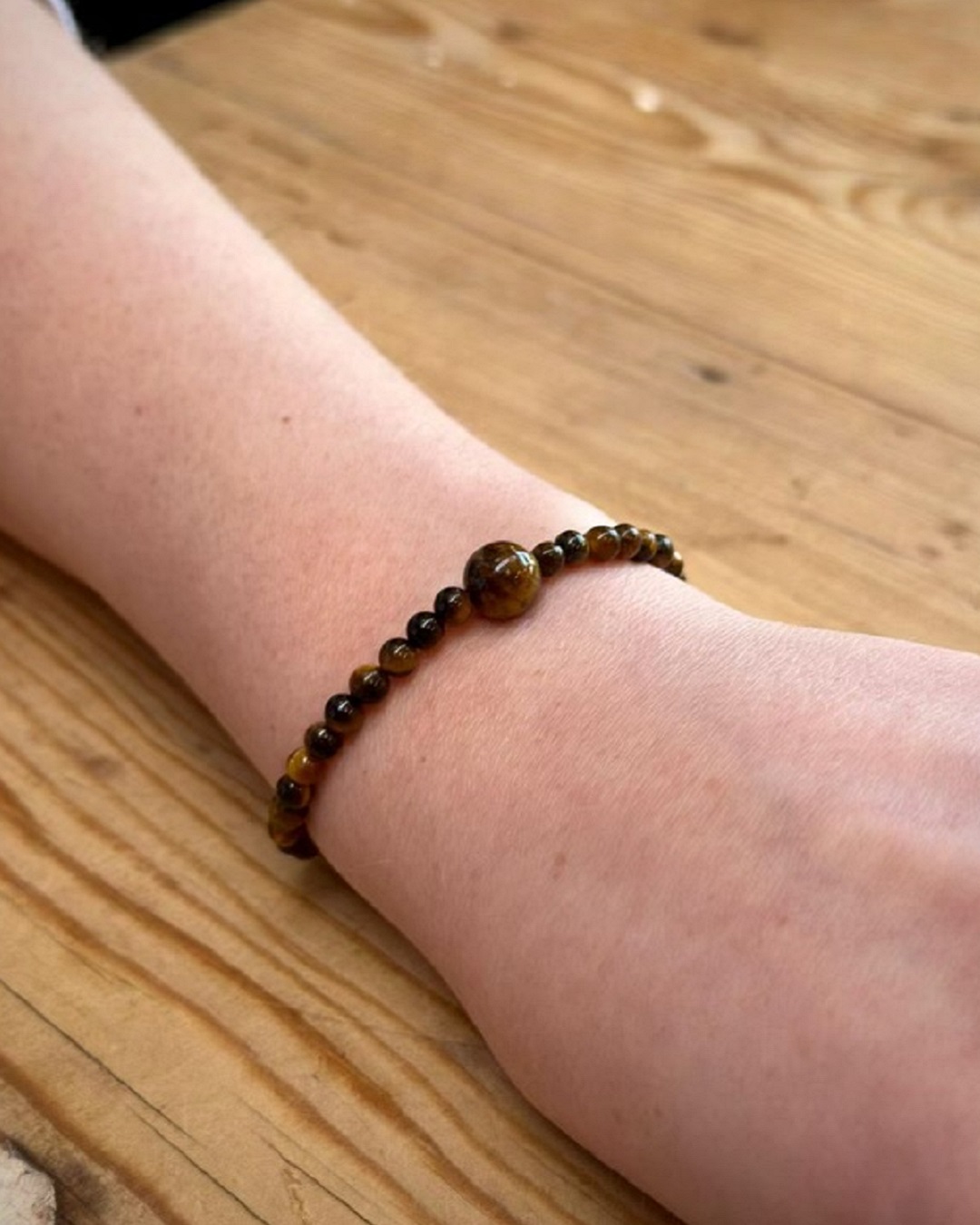 Tigers eye gemstone bracelet on wrist
